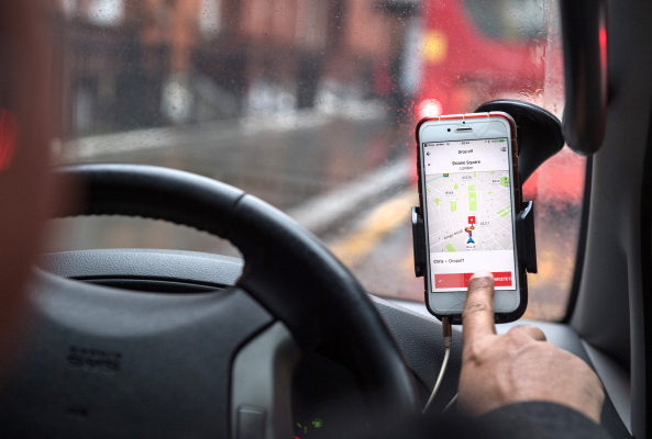 Uber under pressure over facial recognition checks for drivers